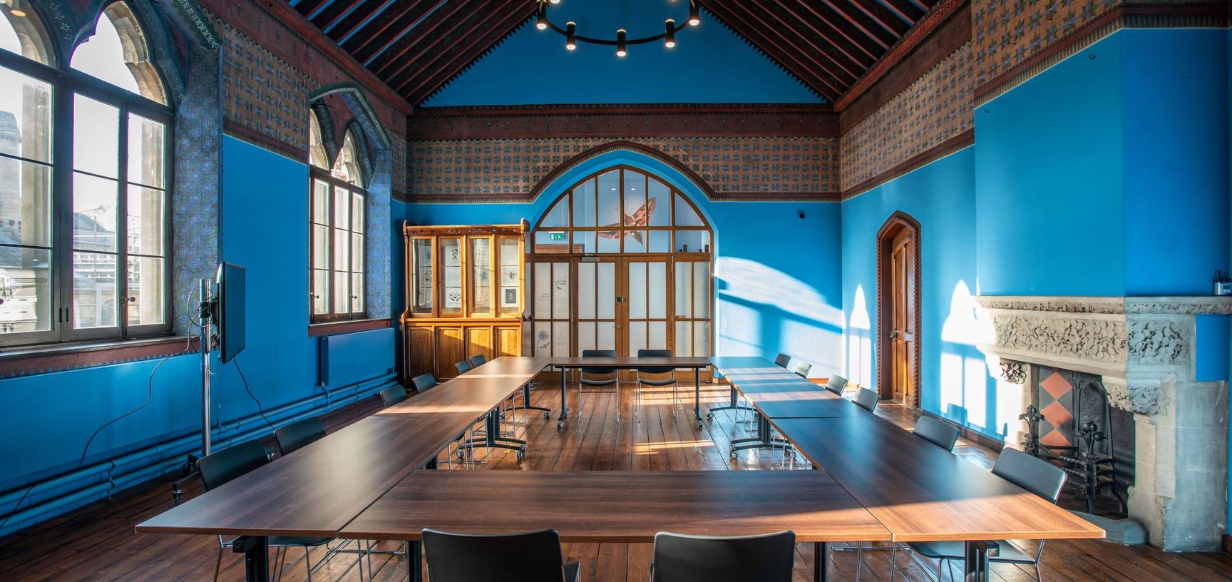 The Westwood room with tables and chairs arranged for a conference