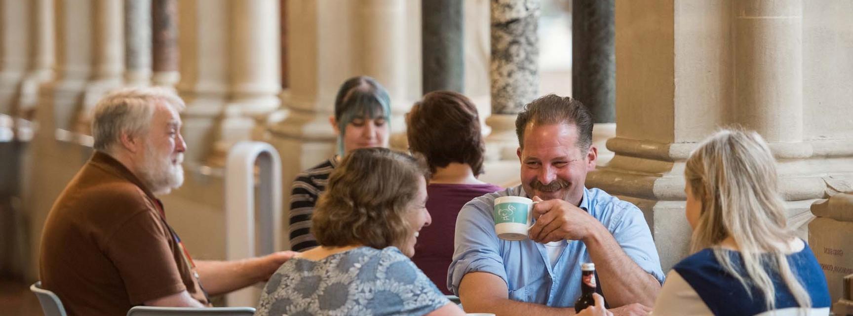 Some visitors enjoying coffee and cake in the cafe