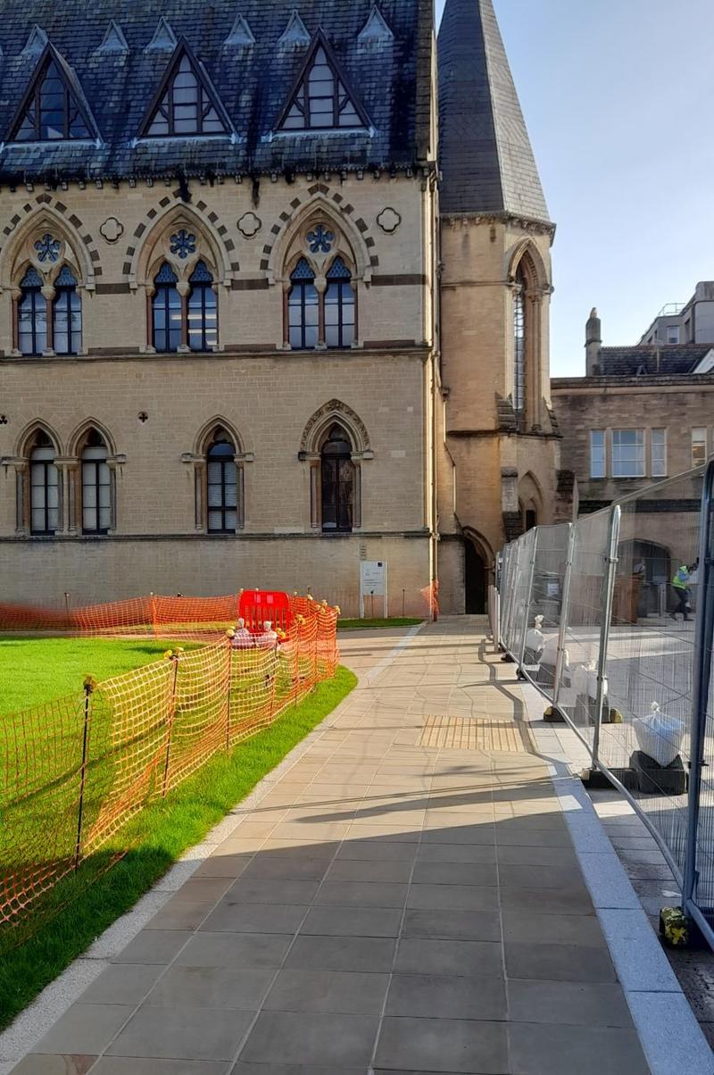 The pathway leading to the accessible entrance is on the right hand side of the lawn