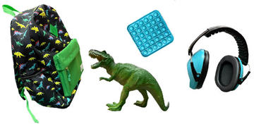 Image of our SEND backpack with toy dinosaur, popping sheet and headphones